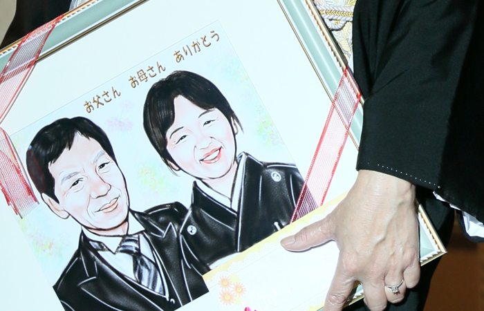 両親の似顔絵